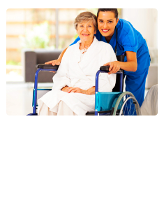 caregiver holding a patient in a wheel chair